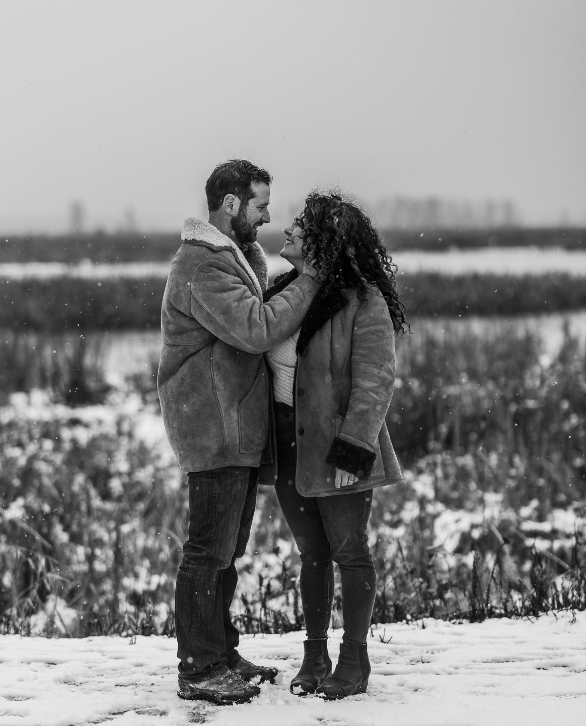 Couple share a romantic moment in the snow
