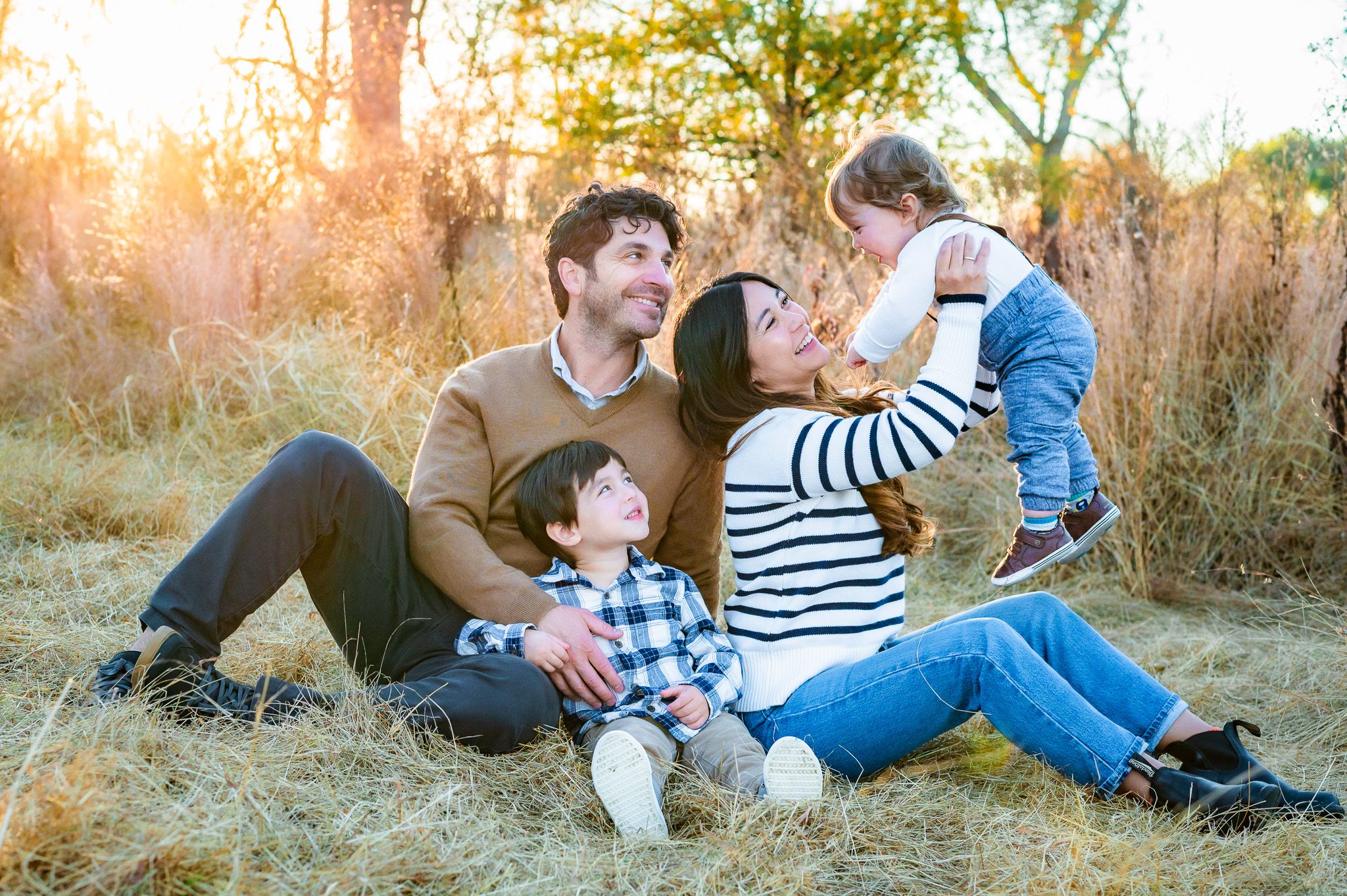 Vibrant, natural, family photoshoot, mother laughing with baby in Frederick, Middletown, New Market Maryland.