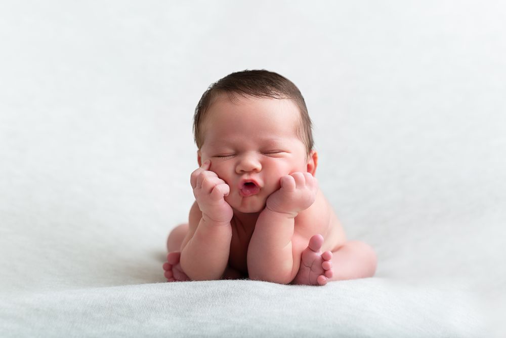 Sweet newborn photography series on white background showing peaceful sleeping poses.