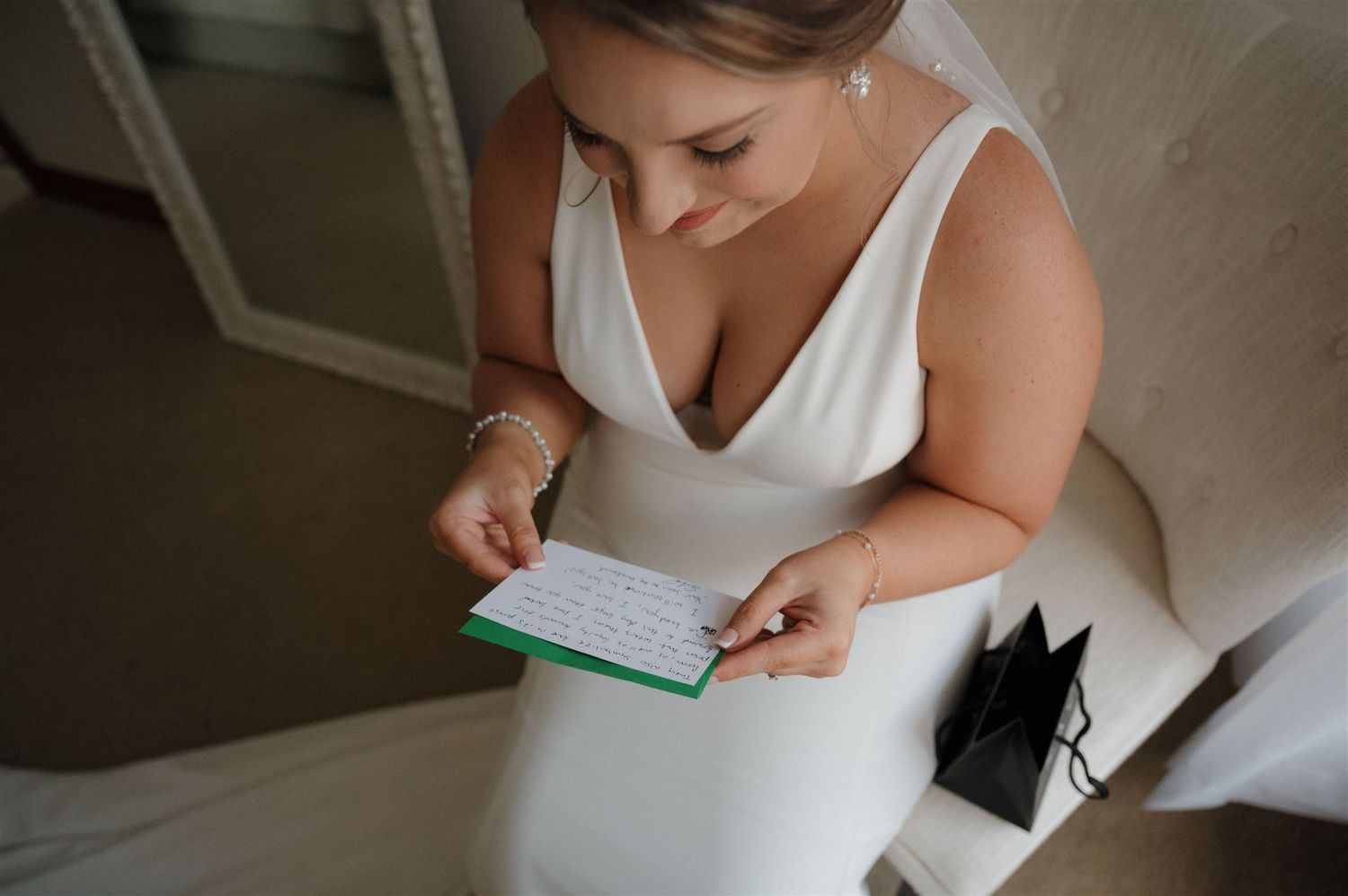 bride getting ready at suite of Fannin Oaks wedding venue in Madisonville, Tx