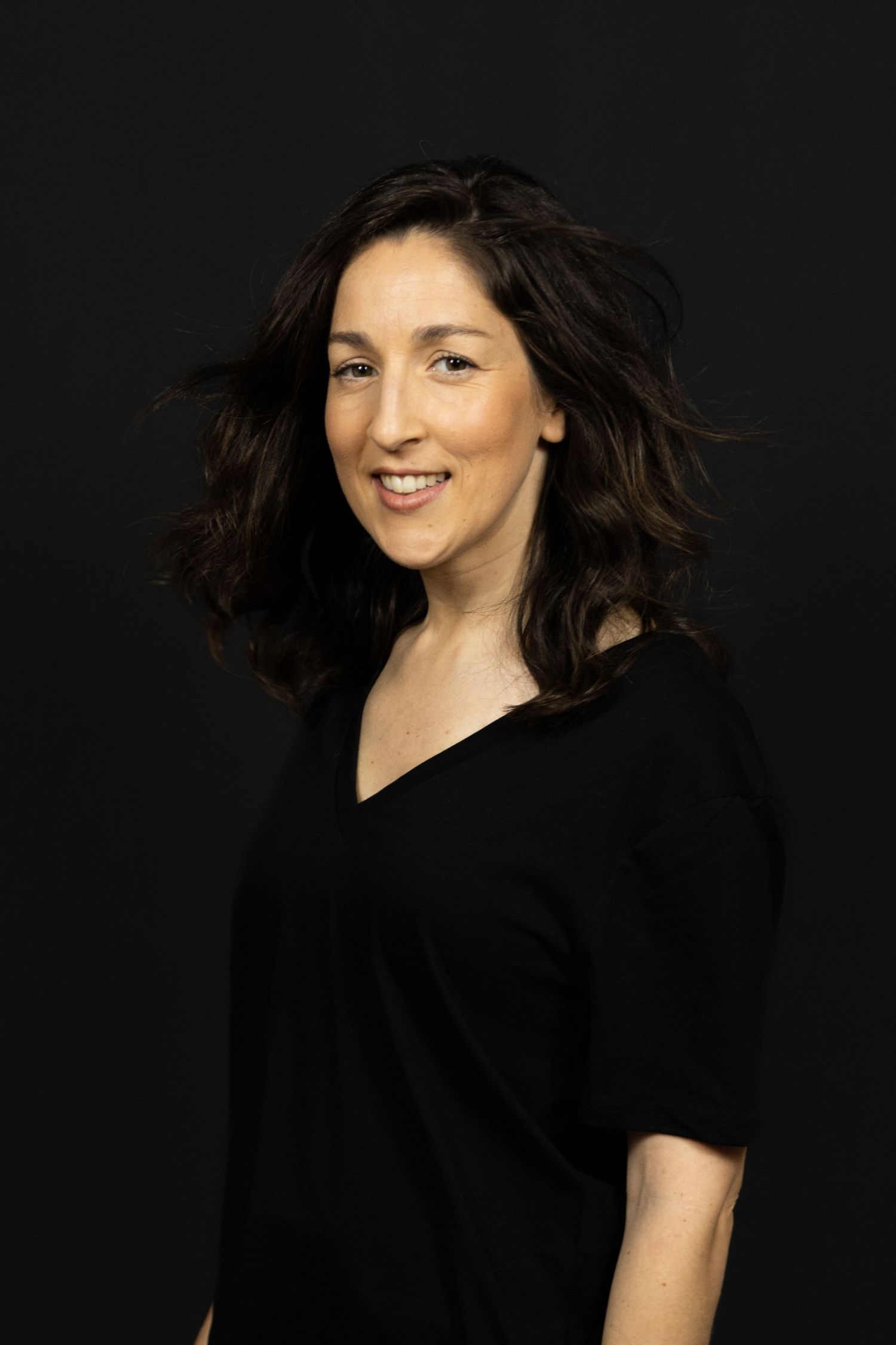 Portrait series showing expressions of joy and laughter against a black background.