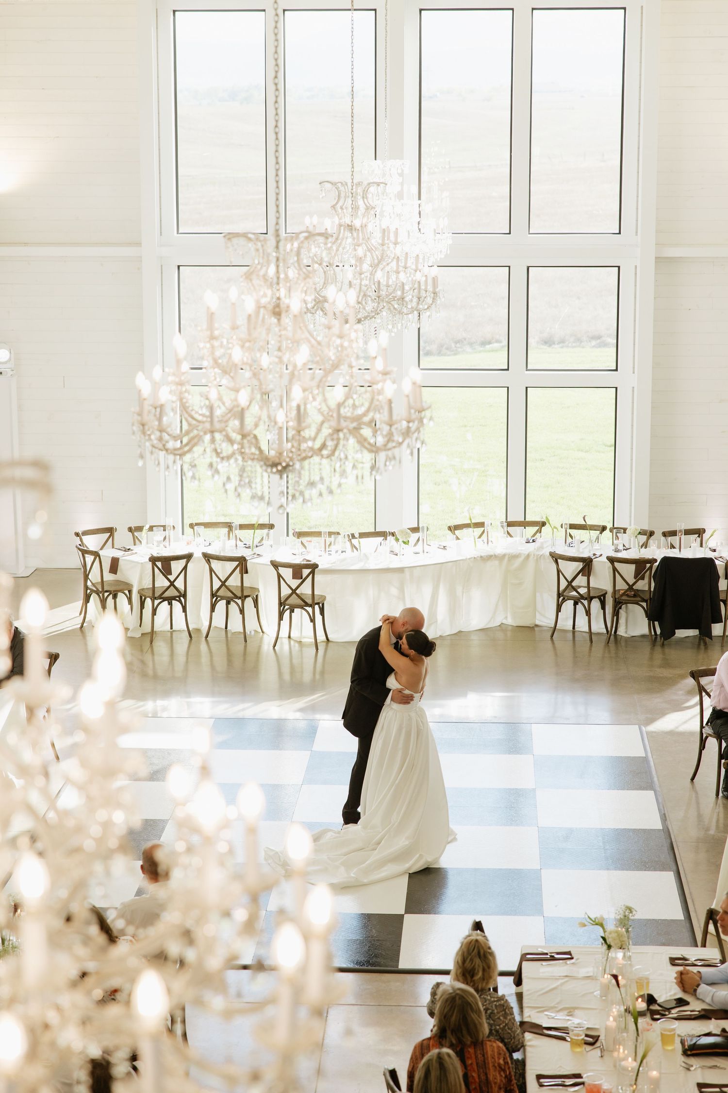 Wind-swept veil photos in black and white showing romantic wedding moments.
