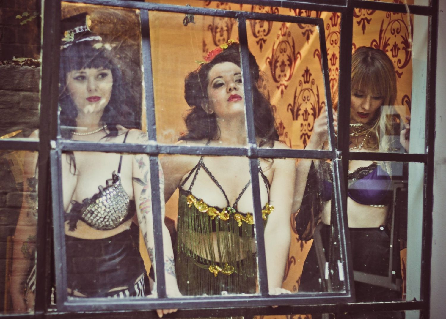 Vintage French Pin Up gals staring out a window in Johannesburg