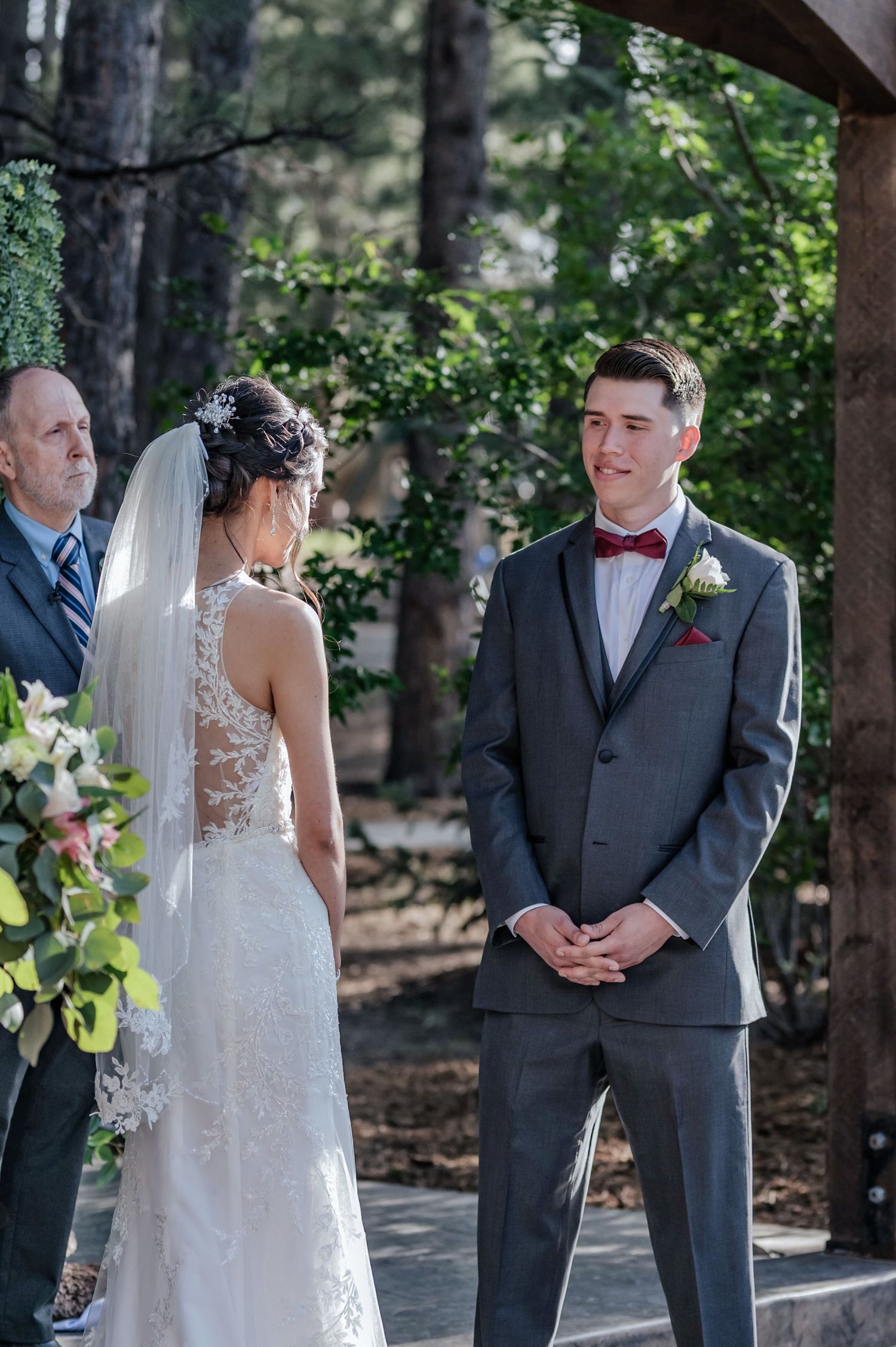 Prescott wedding: heartfelt 'I do' moment between bride and groom, a beautiful declaration of love.