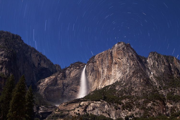 Star trails over Yosemite Falls at night, Yosemite National Park, California