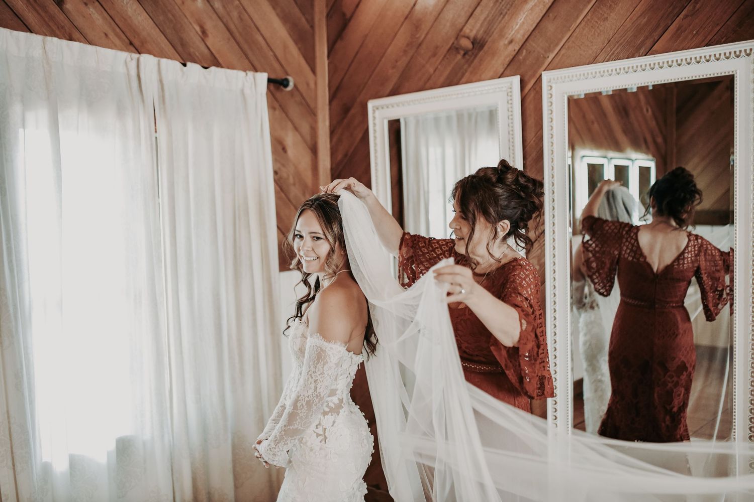 Sweet mother and daughter moment before a Lucky Spur Ranch wedding
