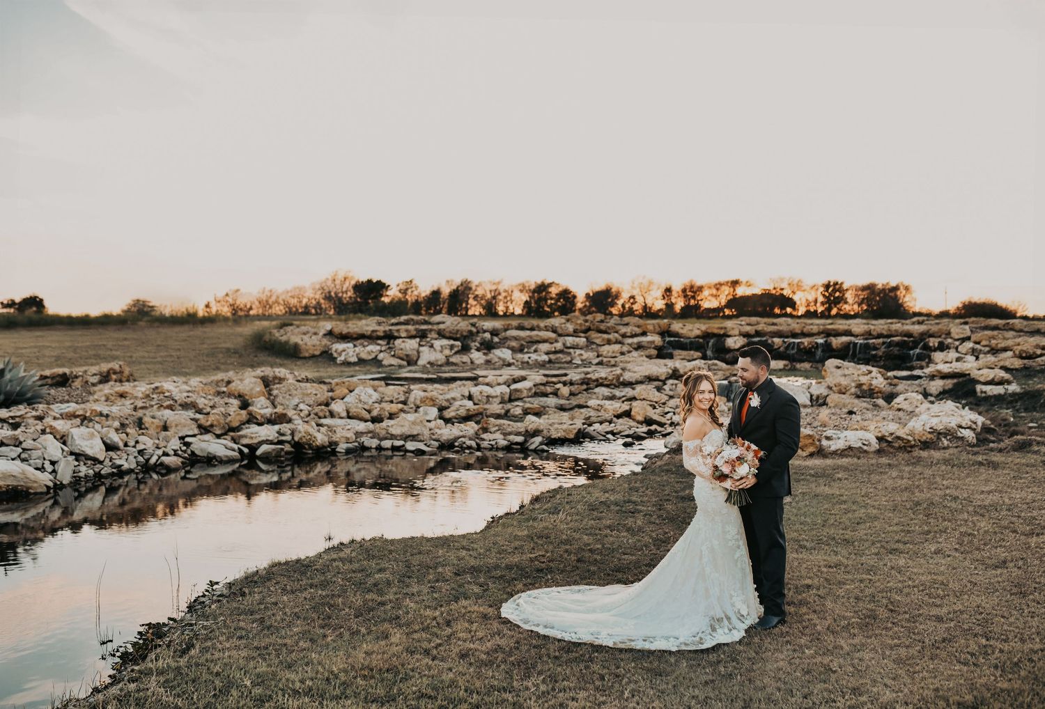 Rustic fall wedding portrait of the bride and groom