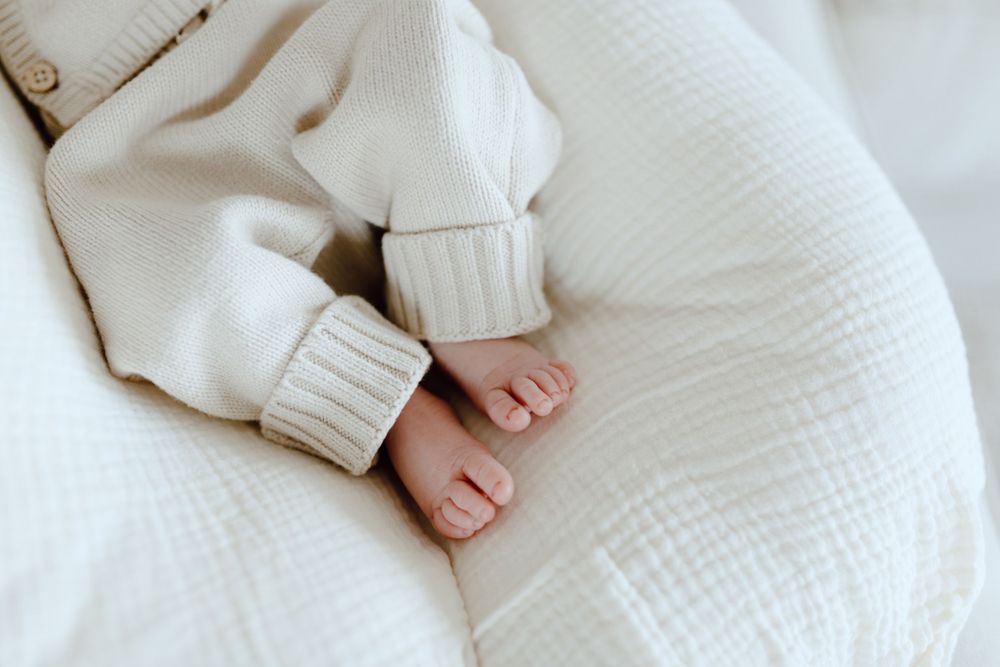 Newborn Photography. Newborn Photos of family with baby. In home newborn photography