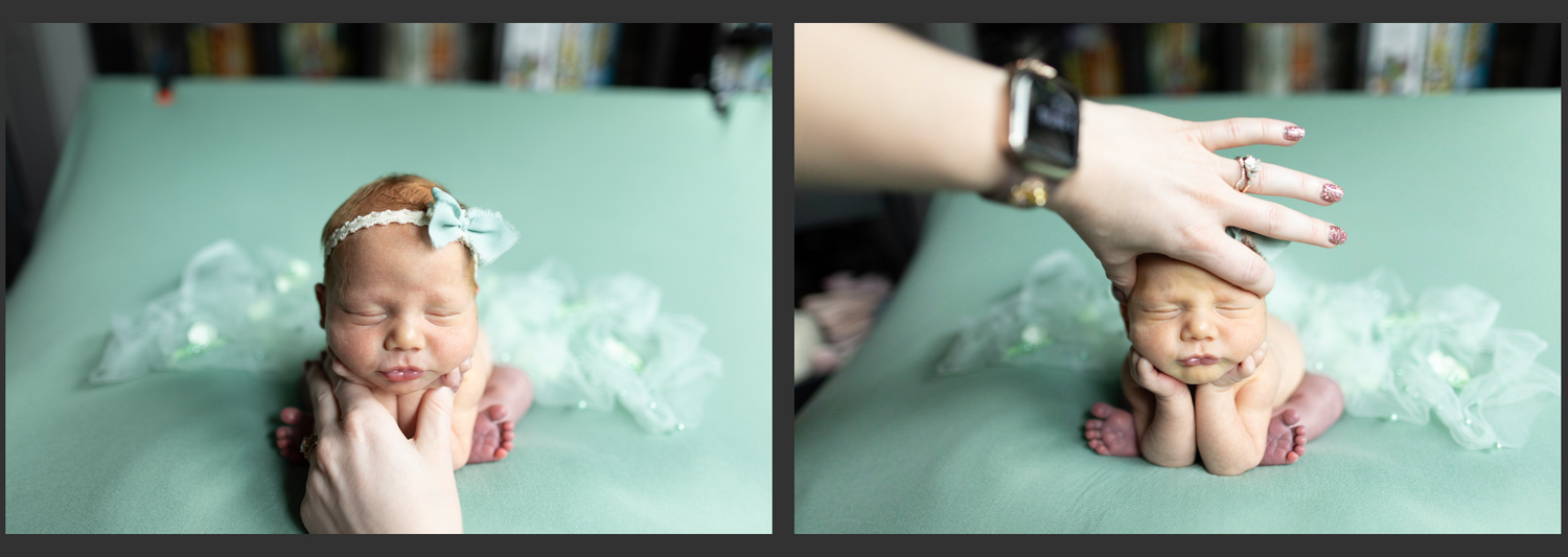 Newborn baby posed on teal blanket with white fluffy props and hands adjusting the scene.