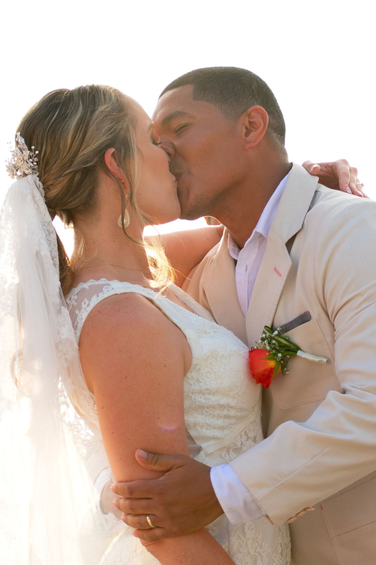 Couple kissing after the ceremony