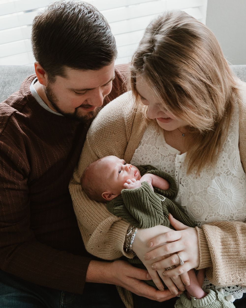 close up family natural light images during in-home newborn portrait session East Texas Newborn Photographer