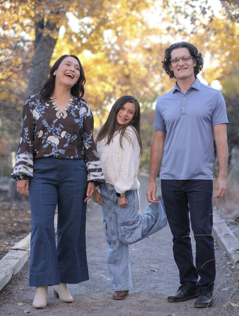Family of three portrait in the Bosque