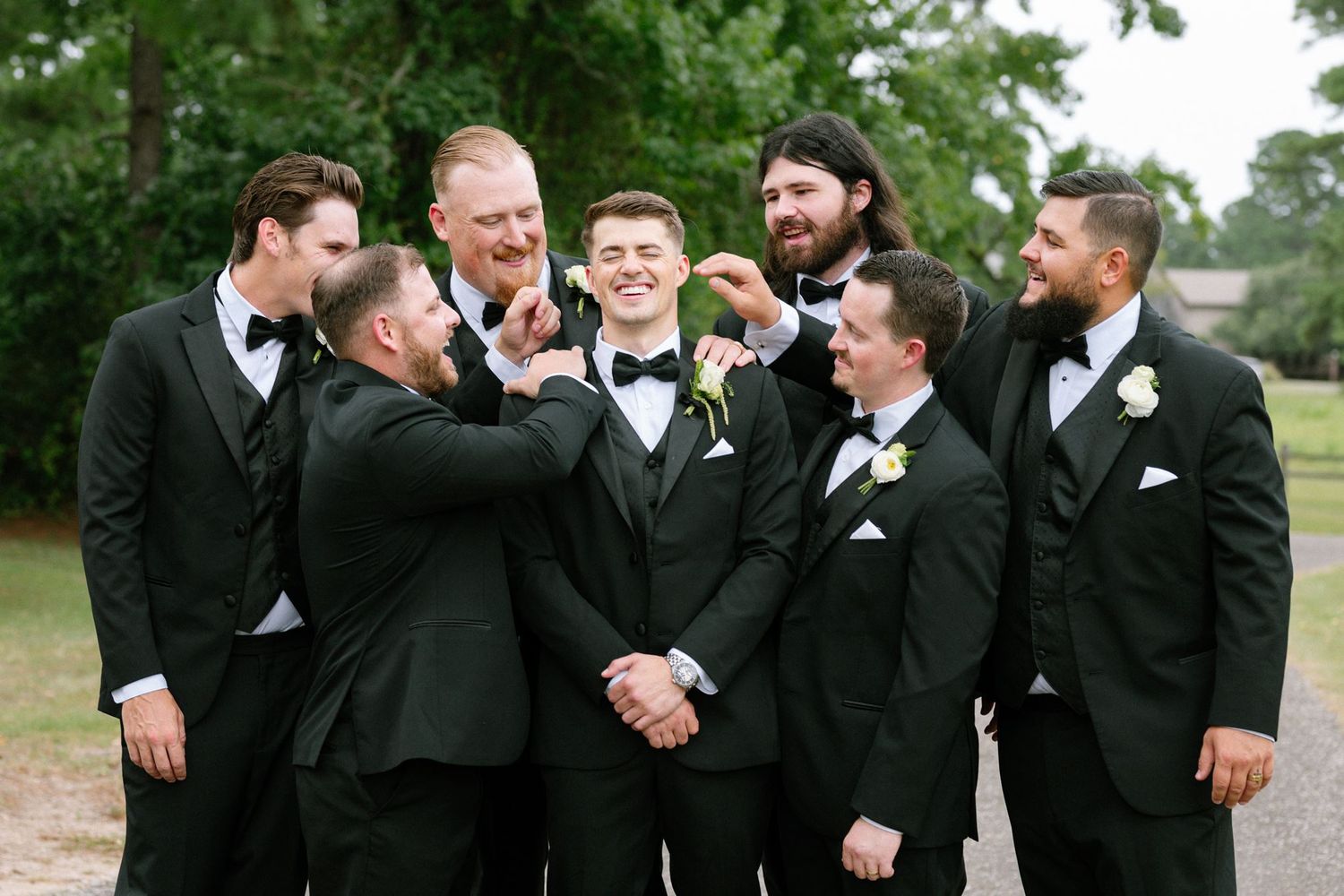 Groomsmen and groom at Historic Hill House in Willis Texas.