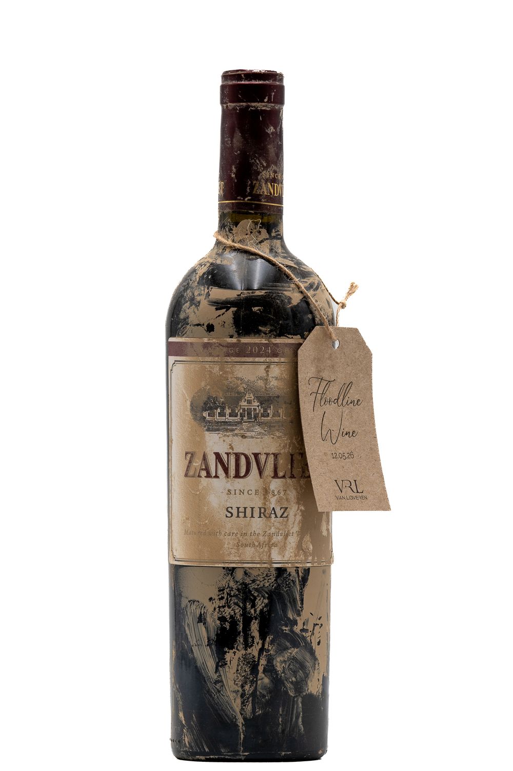 Zandvliet Shiraz red wine bottle with aged, distressed label and handwritten tag on white background.