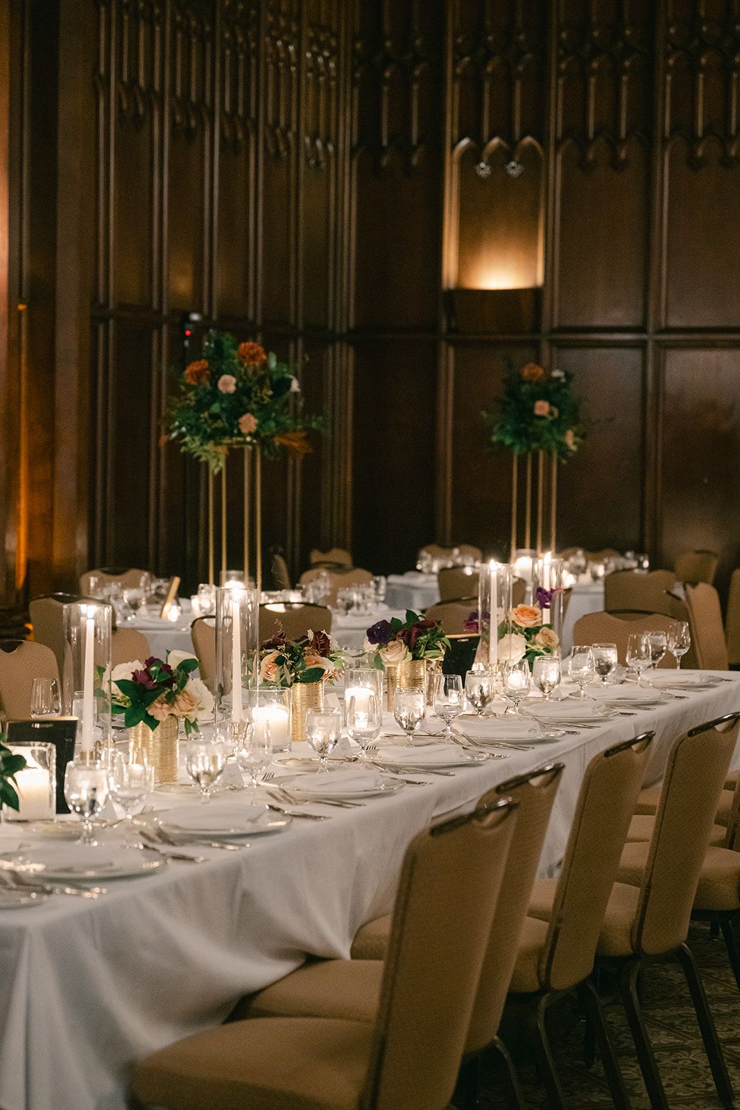 Elegant wedding reception table with tall floral centerpieces, candles. - University Club of Chicago Wedding Reception