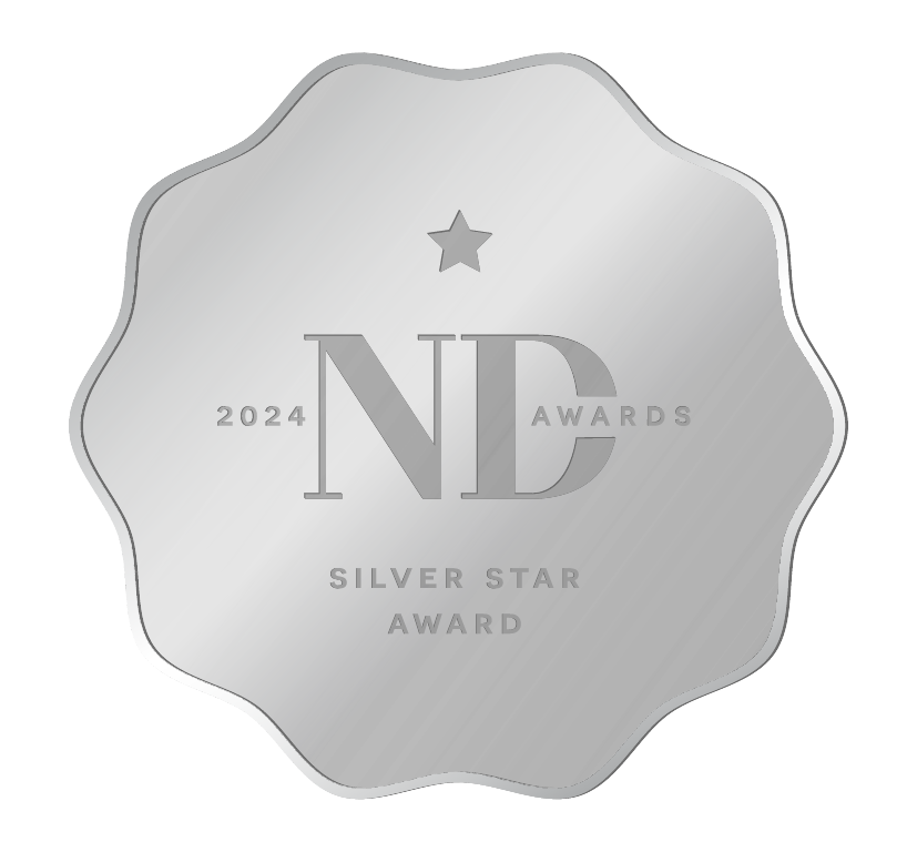 Silver metallic 2024 ND Awards Silver Star Award badge with scalloped edges and star emblem.