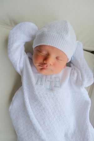 Baby newborn session laying down asleep.