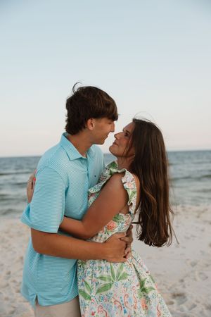 Couple photo session in the sand on the beach in Gulf shores and Orange beach.