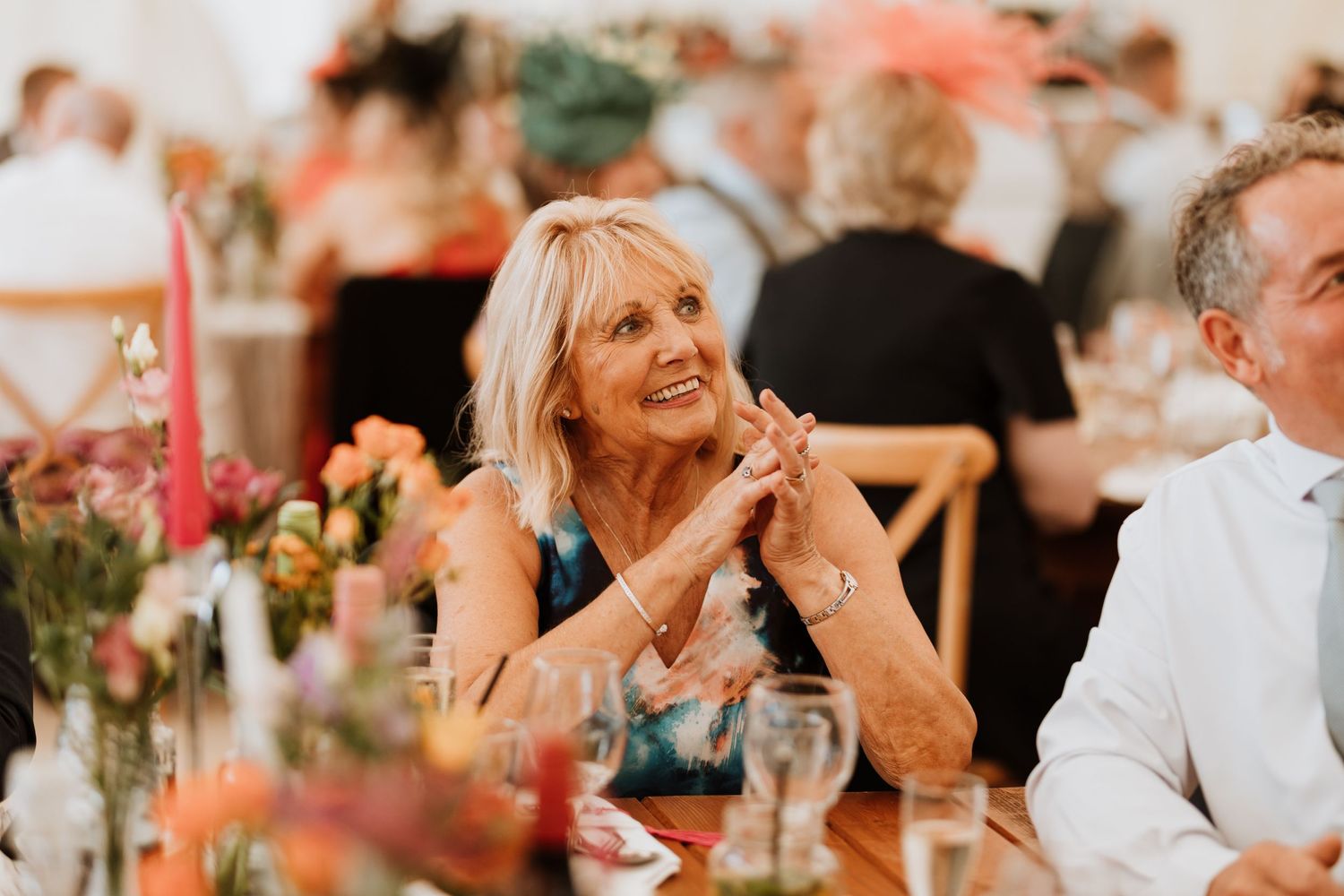 Guest reactions during speeches, candid wedding photography