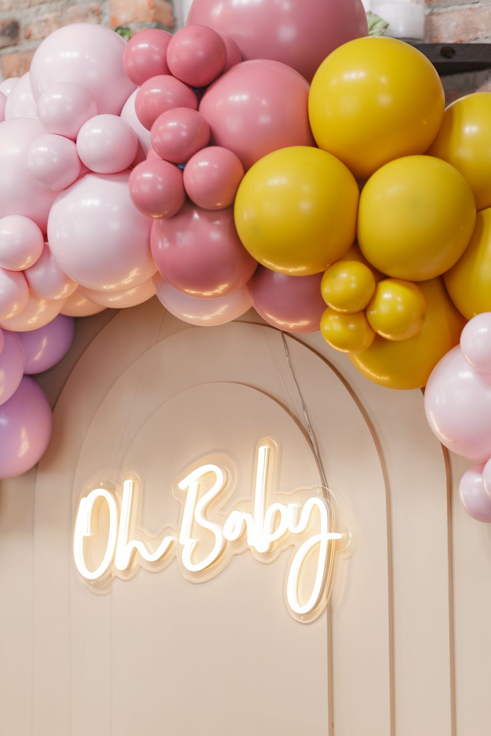 Close-up detail of balloon decor at a baby shower, captured by NYC photographer Paula Ortiz