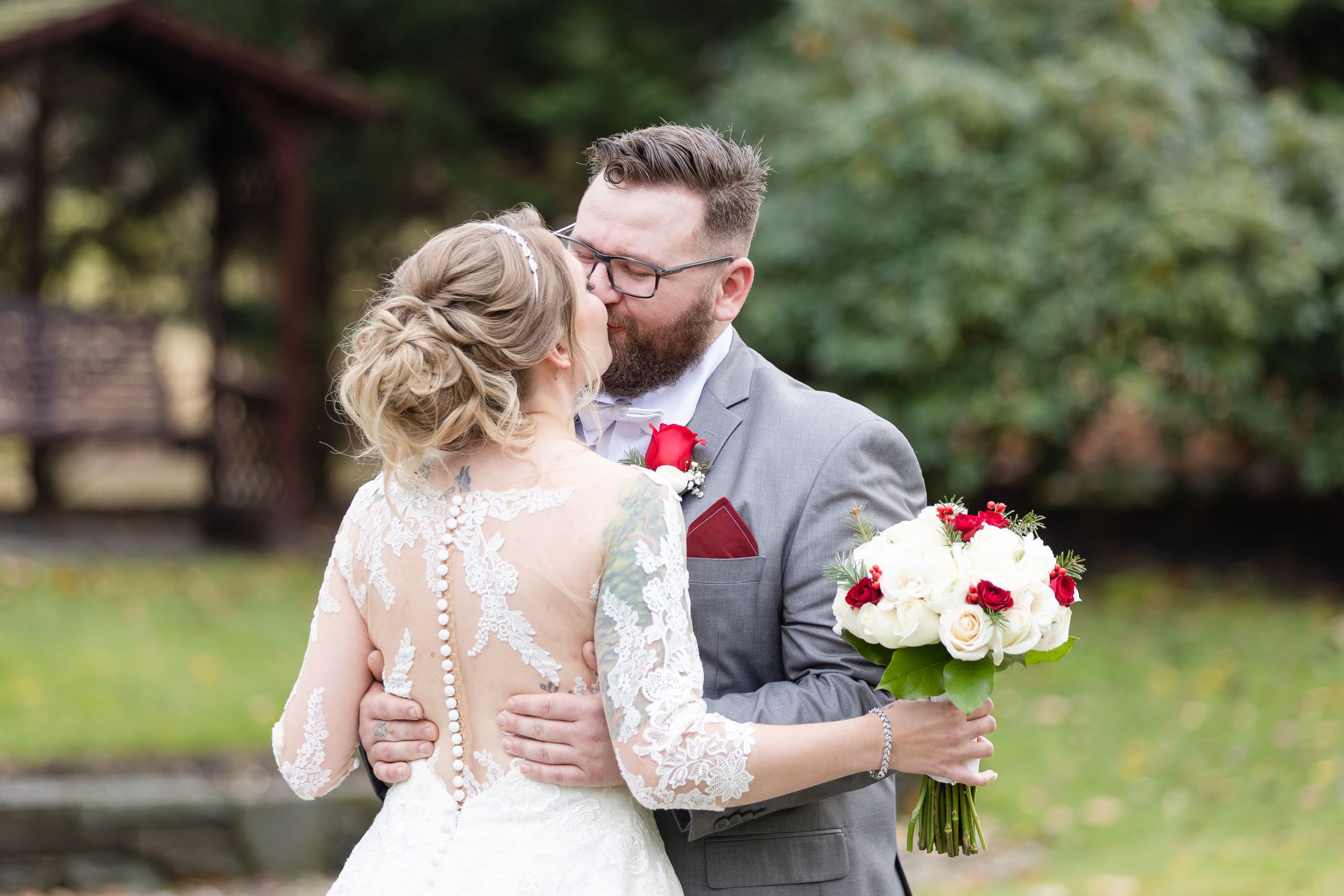 Bride and groom kiss after first look - Lynn Monaco Photography