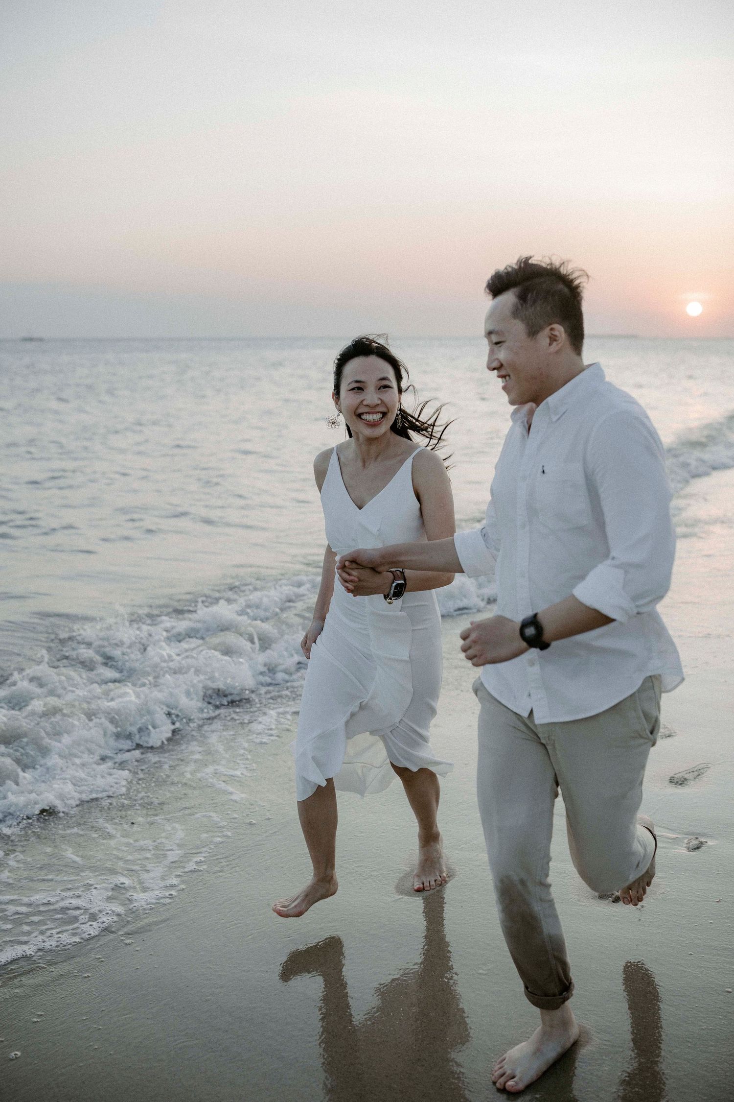 Happy couple enjoying Zanzibar coastline