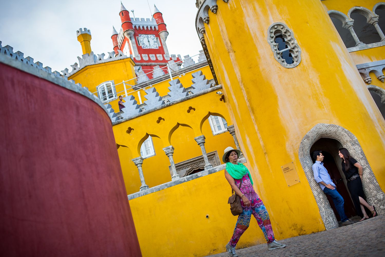 Colorful Pena Palace in Sintra Portugal with its vibrant yellow and red towers.