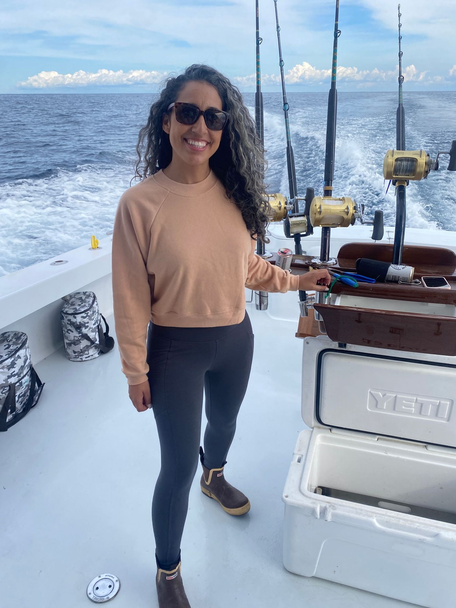 Rachel Cuesta wearing a Reel Girl Clothing Co  wearing High Waist Reel Girl Leggings and  Crewneck Raglan Pullover