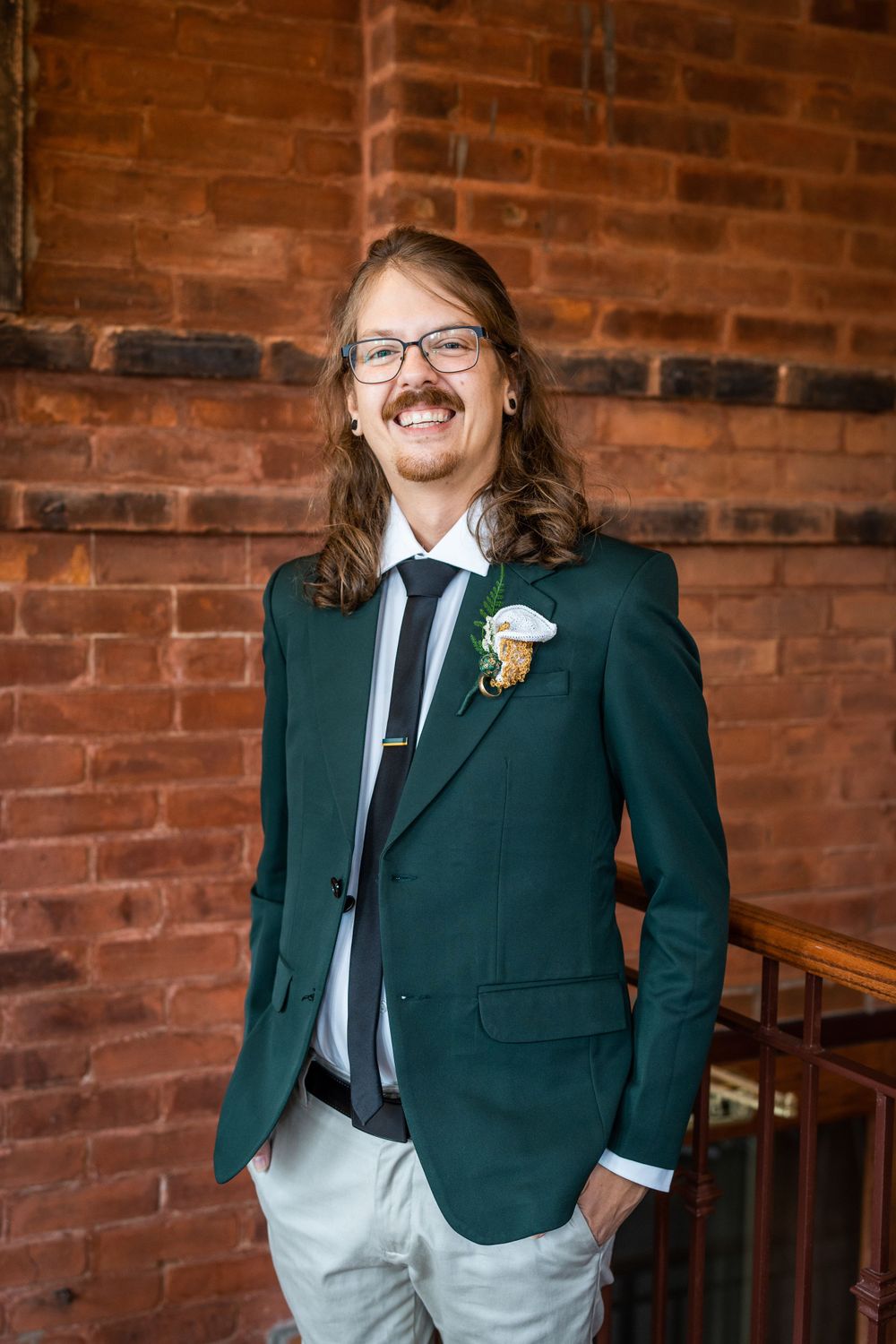 groom portrait at acton town hall before wedding ceremony