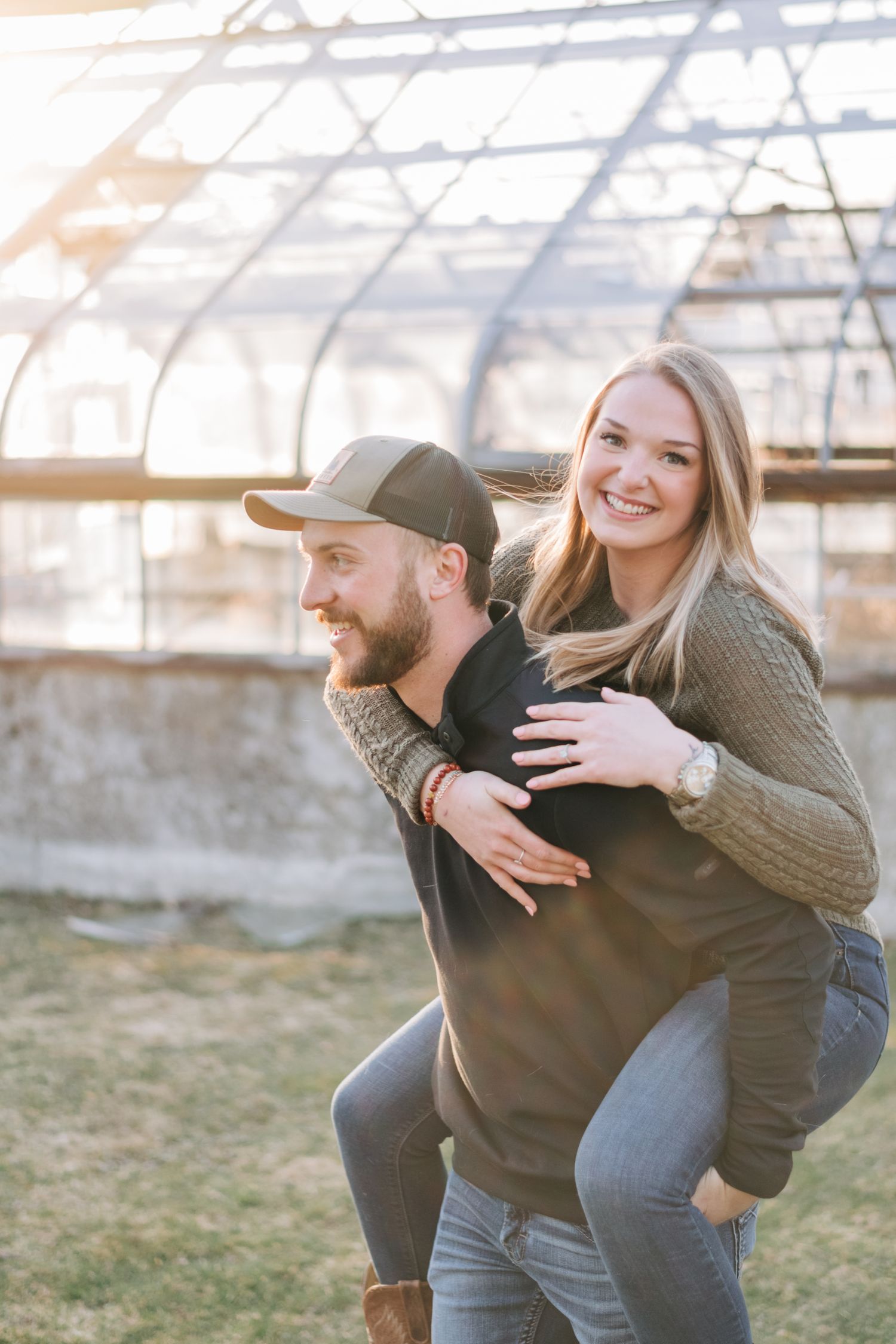 man giving woman a piggy back ride