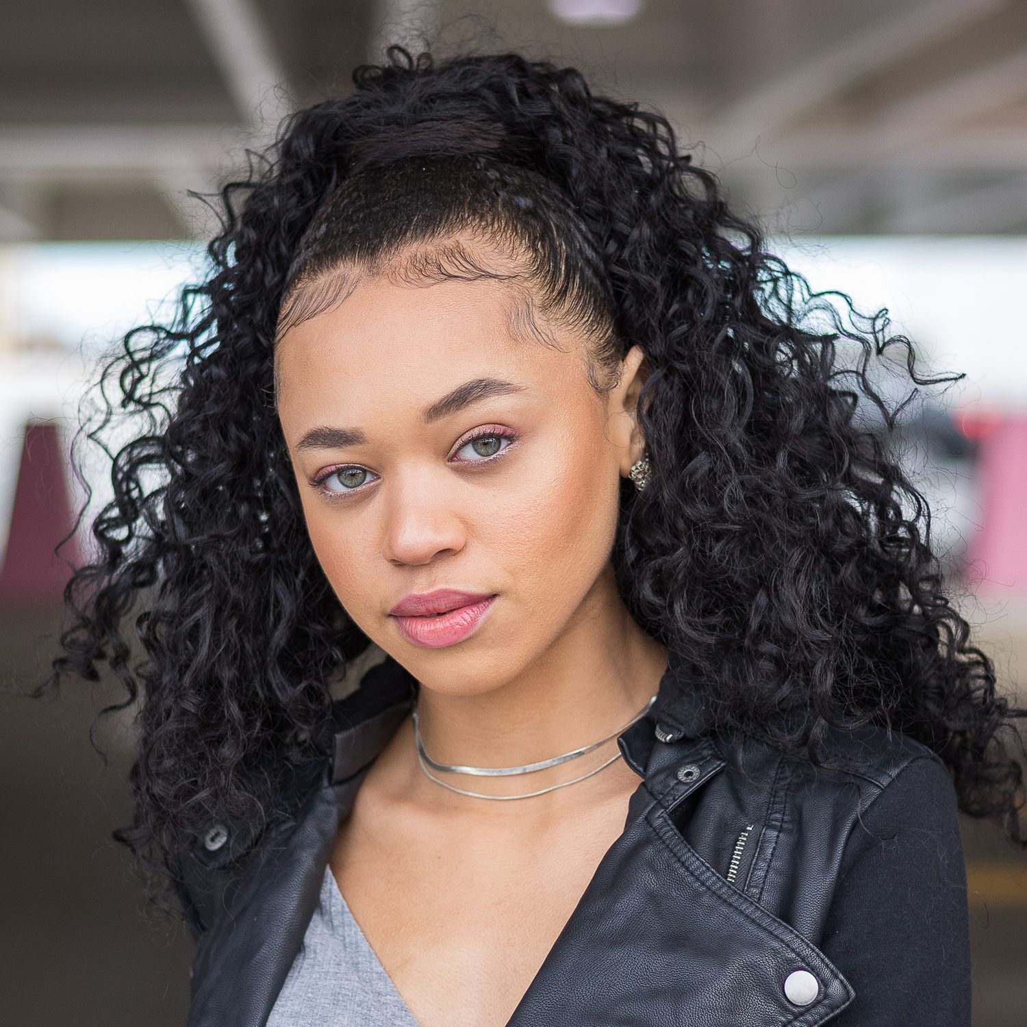 Portrait of a black woman in her early 20s at a parking garage in Detroit's The Z Lot.