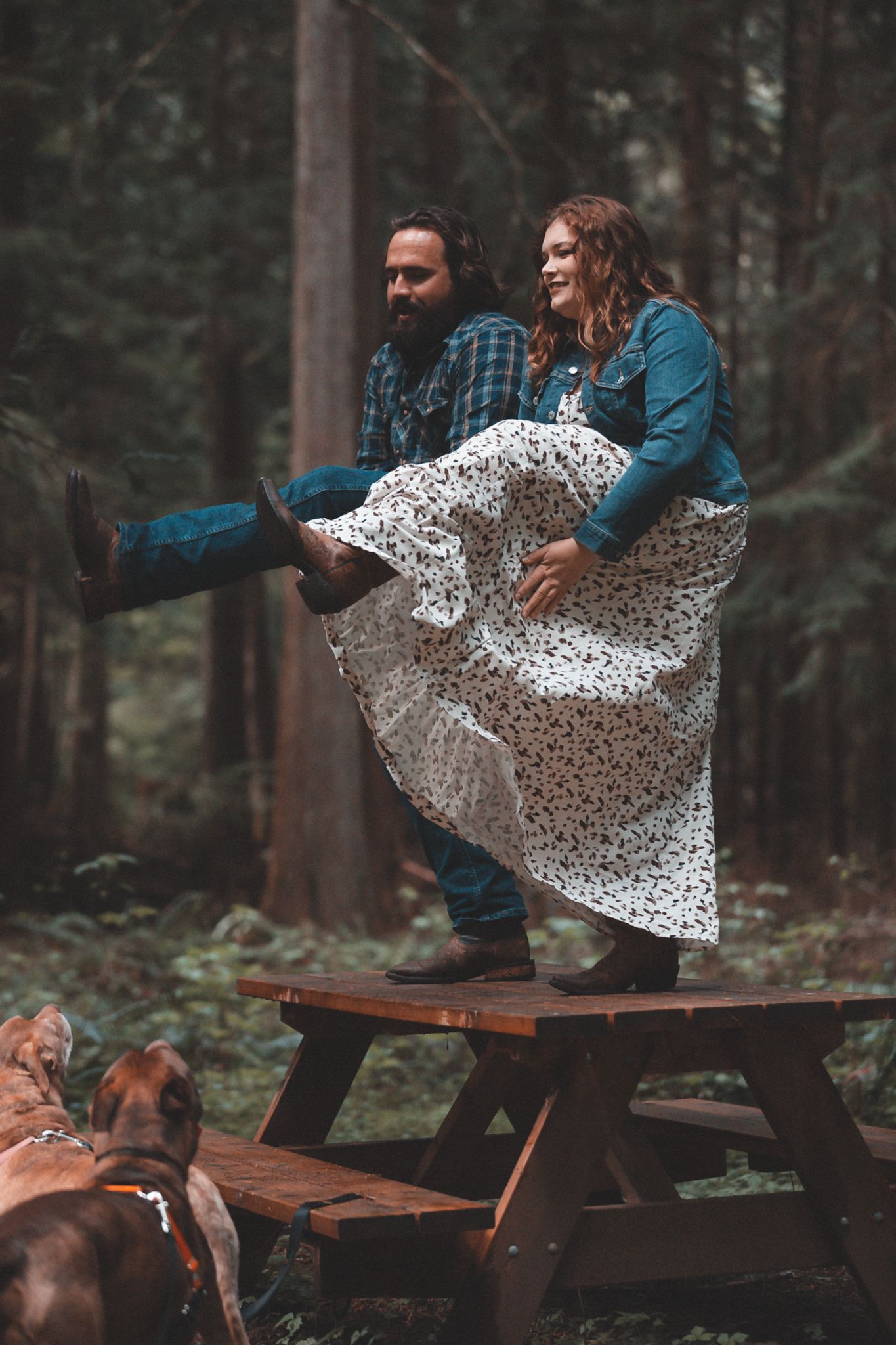 A couple dancing on a wooden table top