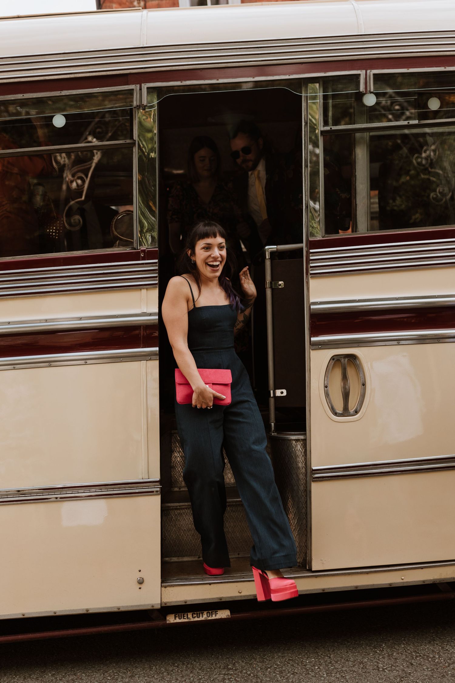 Guests arriving on vintage 60s bus to montgomery church