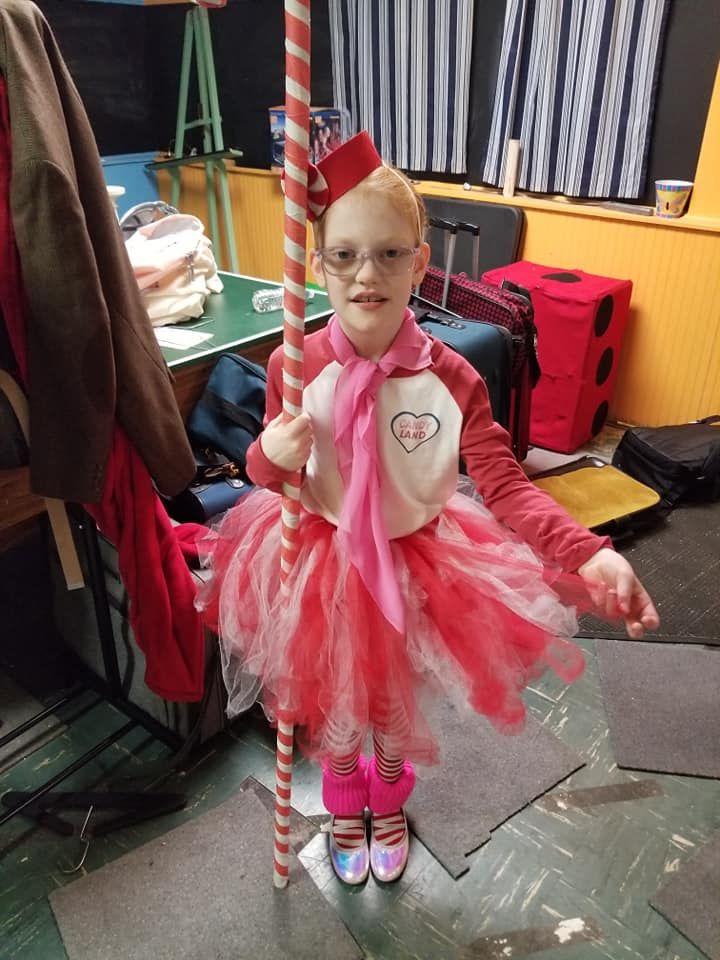 Michelle's second daughter in her costume for her Theatre club's play.
