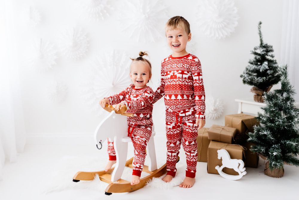all white christmas photoshoot with rocking horse Hereford