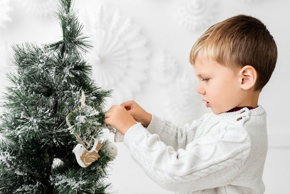 all white christmas photoshoot decorating christmas tree Hereford