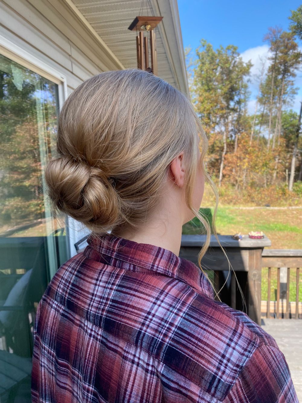 Multiple views of a braided hairstyle with a plaid shirt against an outdoor backdrop.