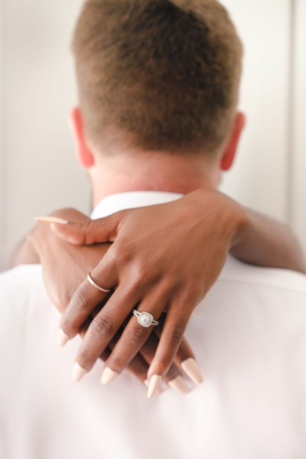 Family Photography: Amazing wedding engagement announcement photo of hands and wedding ring