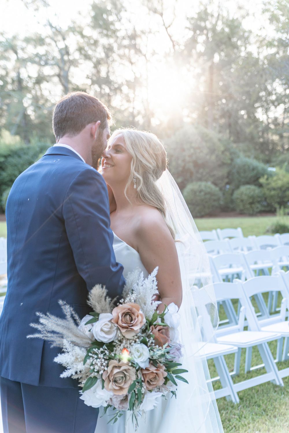 bride and groom nose to nose