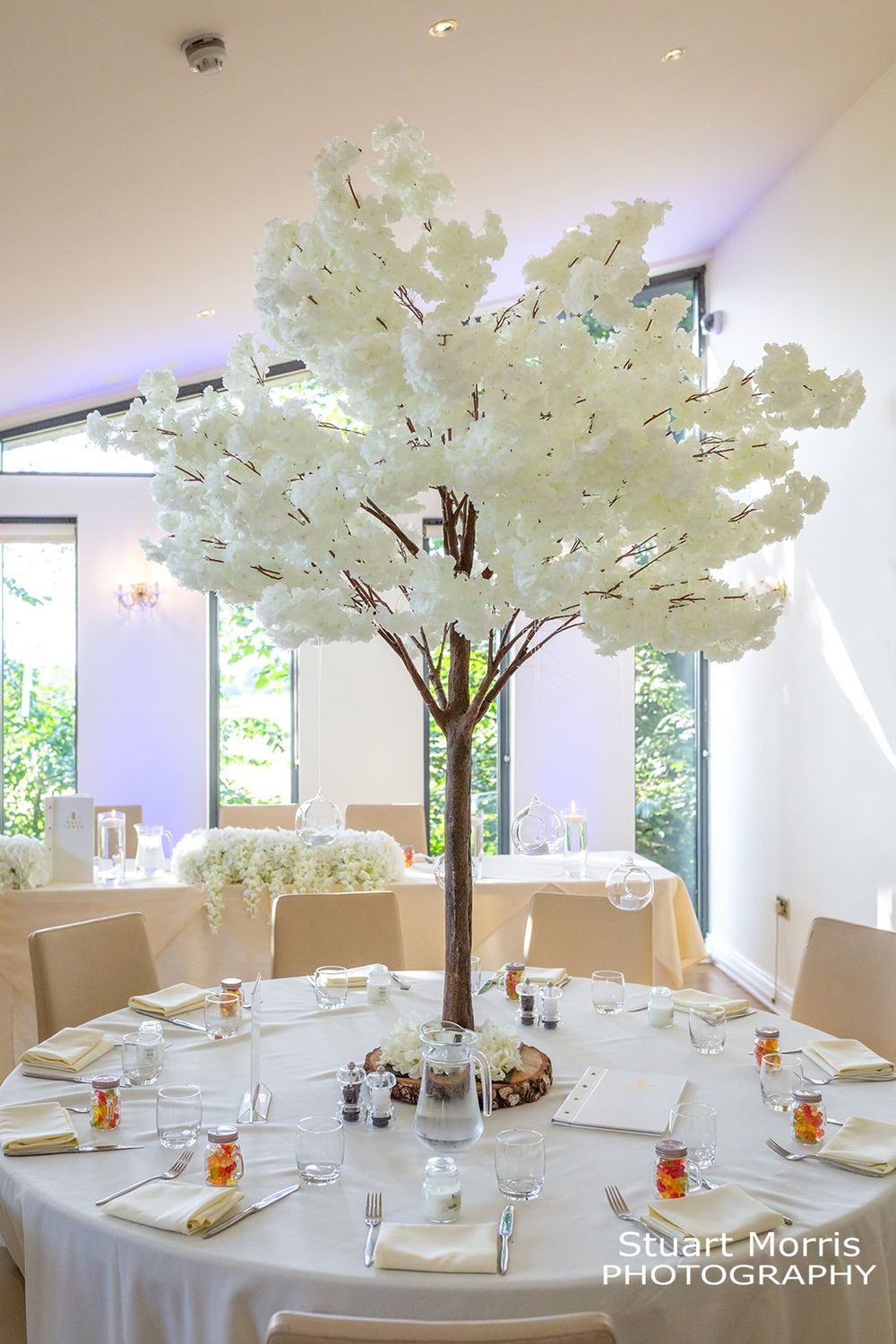 Large flower tree table centrepiece.  West tower wedding venue photographer. Lancashire wedding photography