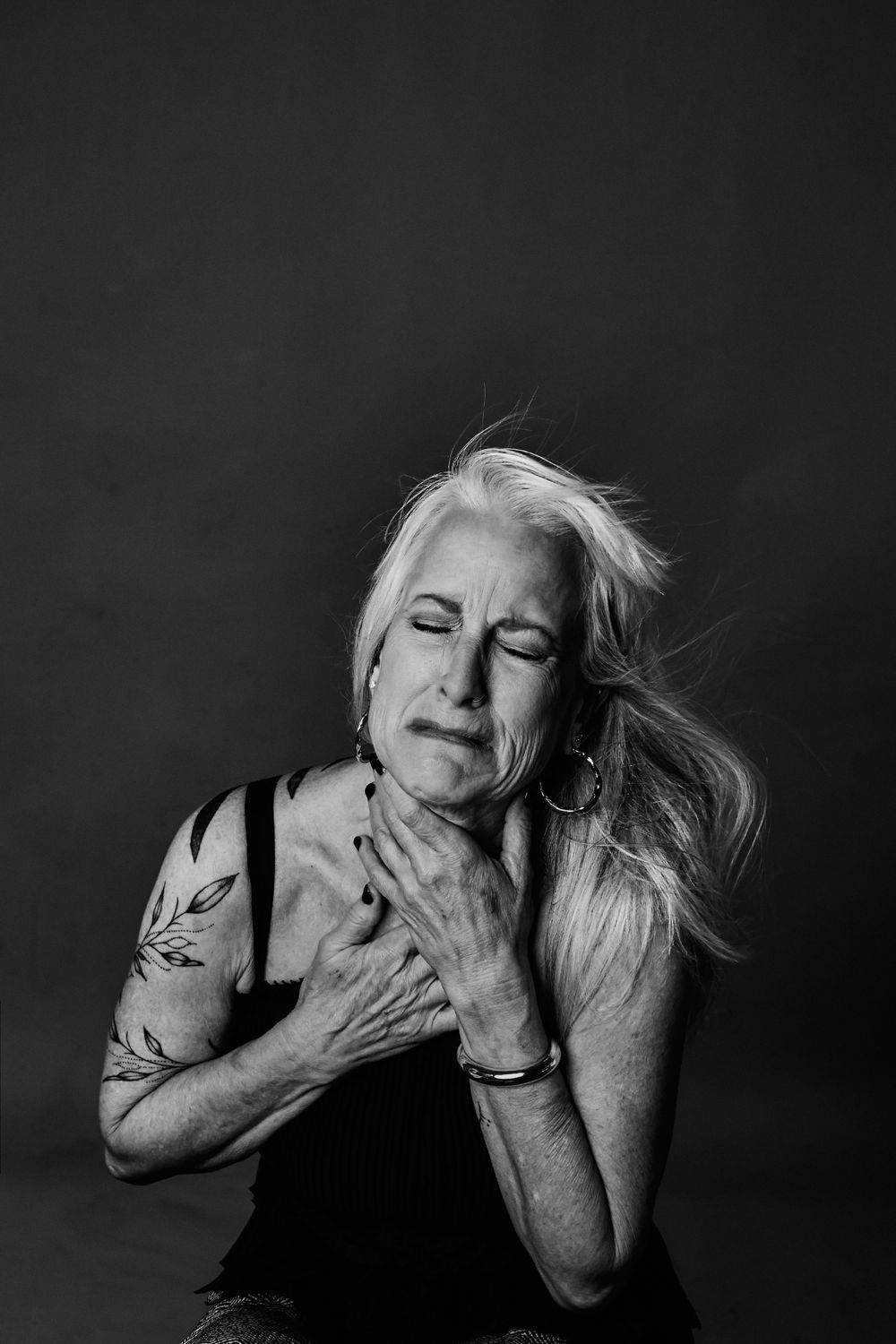 Emotive black and white photography series capturing raw emotional moments.