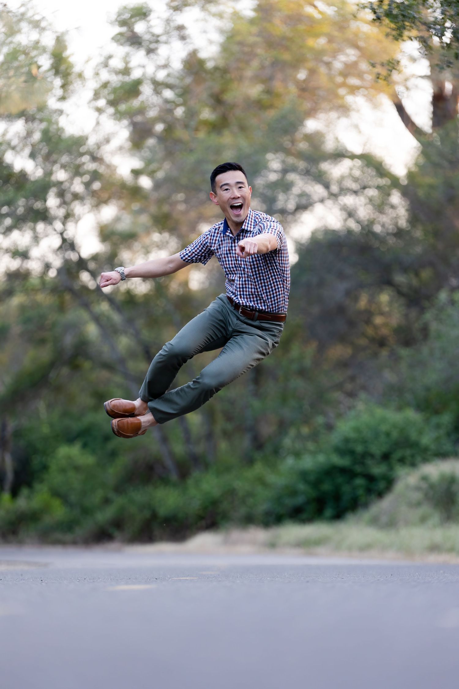 Headshot, Folsom, California, Business Casual, jumping and pointing