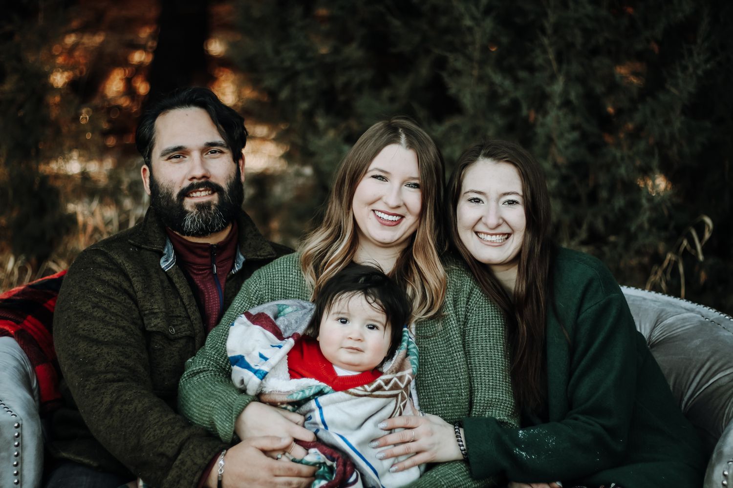 Candid family portraits taken outdoors during winter season.