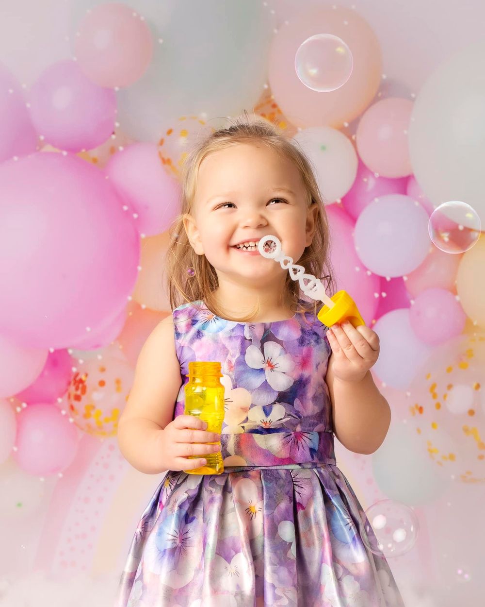 Girl birthday portrait photo with bubbles