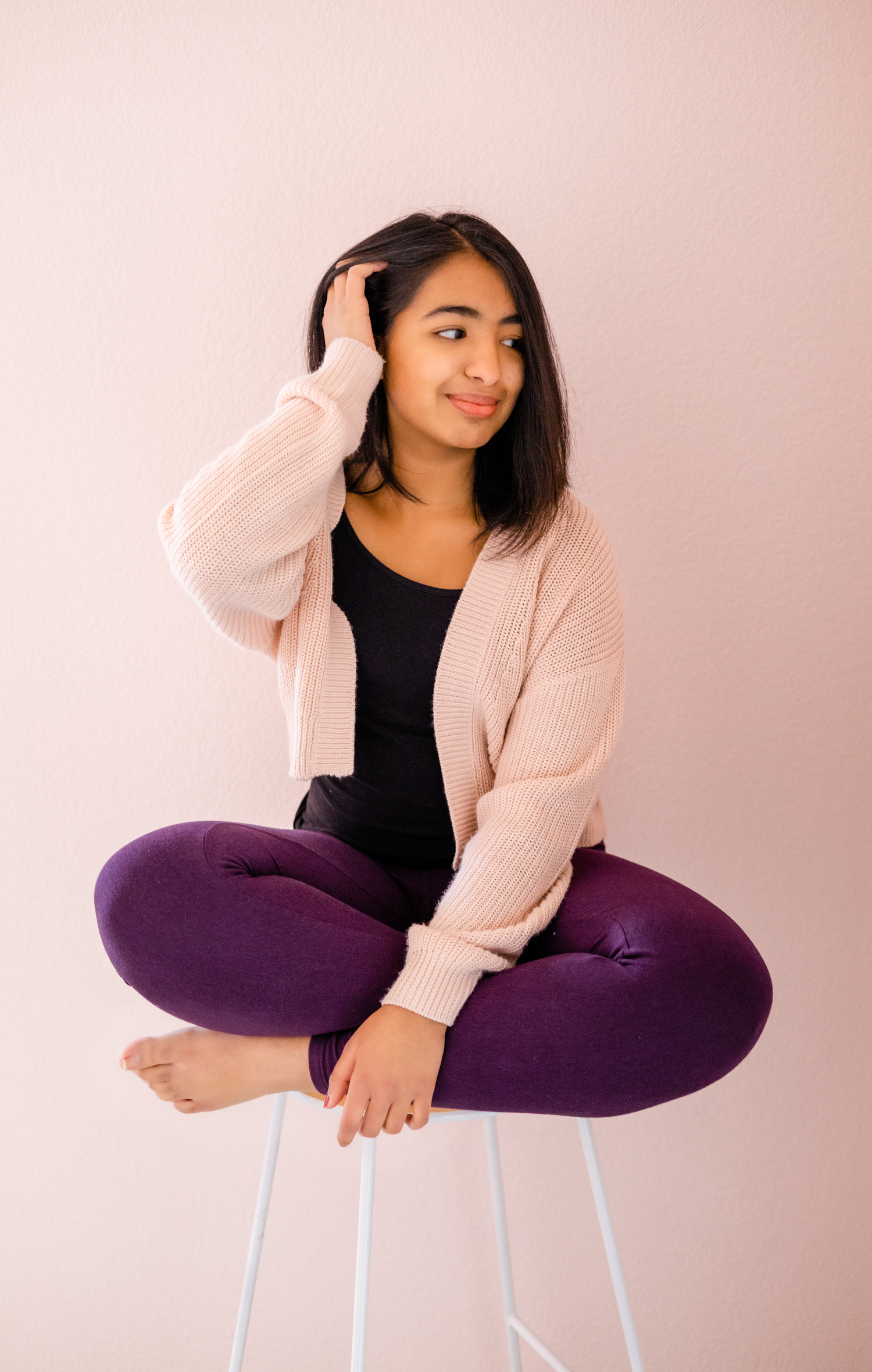 photo of girl with leggings and cardigan