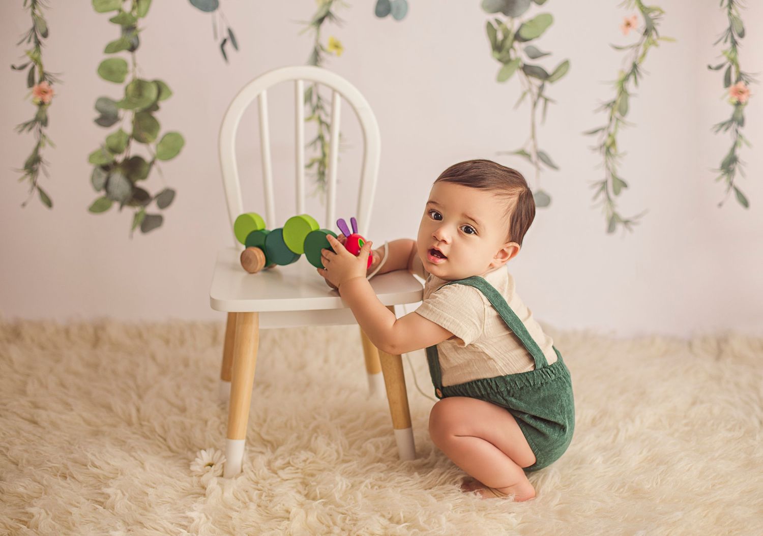 detres photography baby boy holding hungry caterpillar