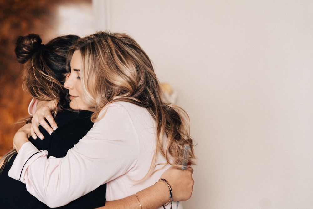 Lisa Faulkner cuddling friend on wedding day