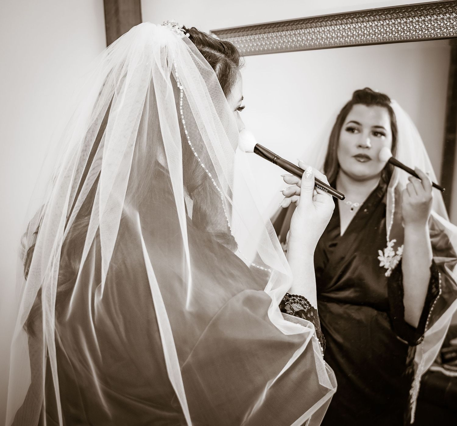 Artistic black and white veil shots showing flowing fabric and movement.