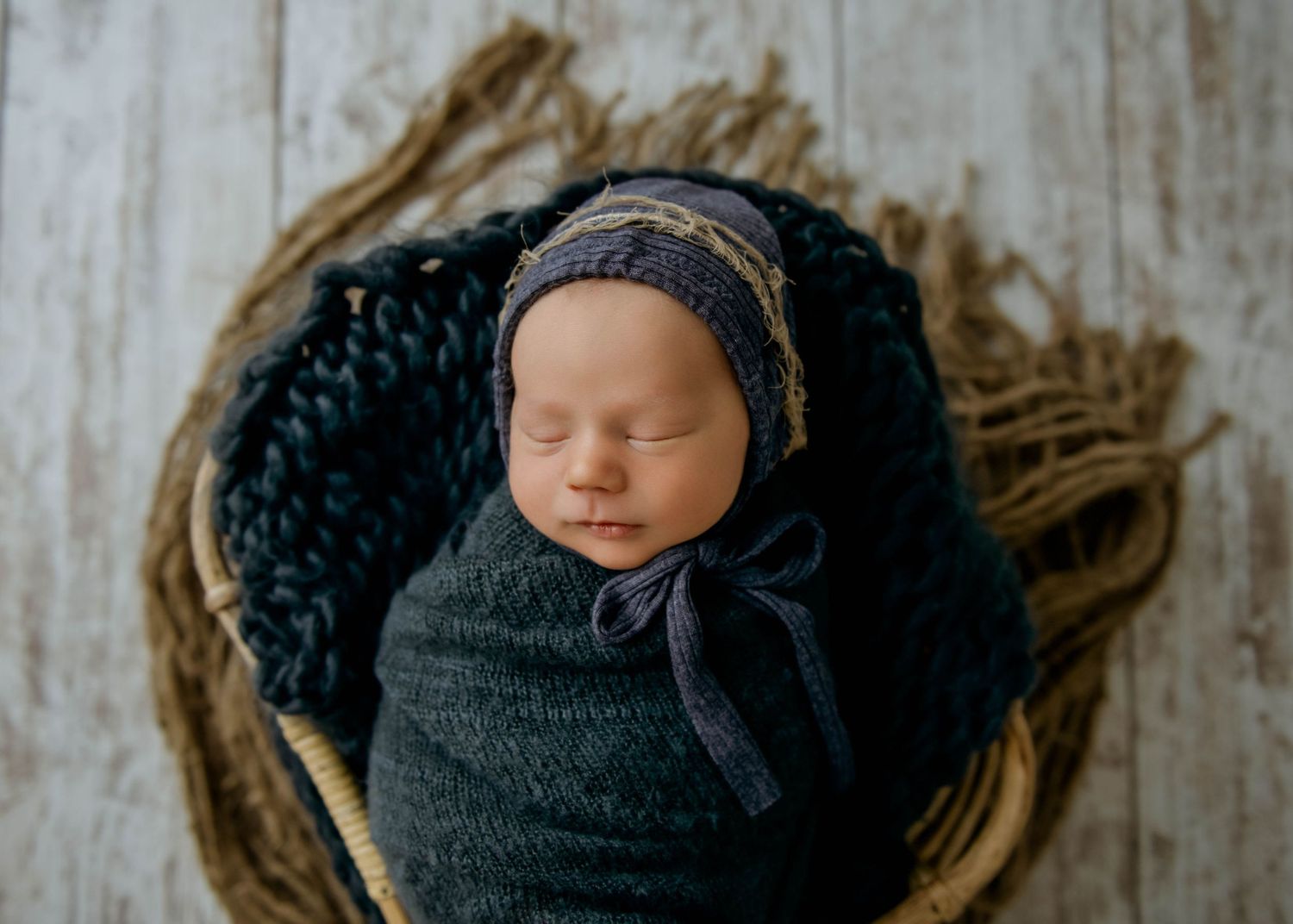 newborn boy in blue