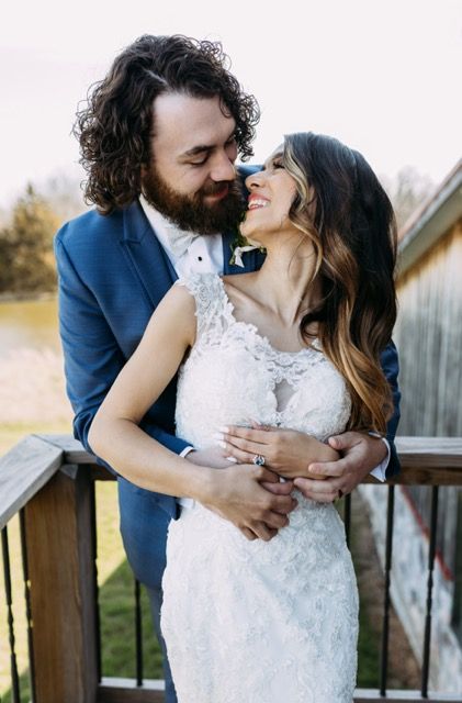 Bride and groom laughing together and sharing a special moment